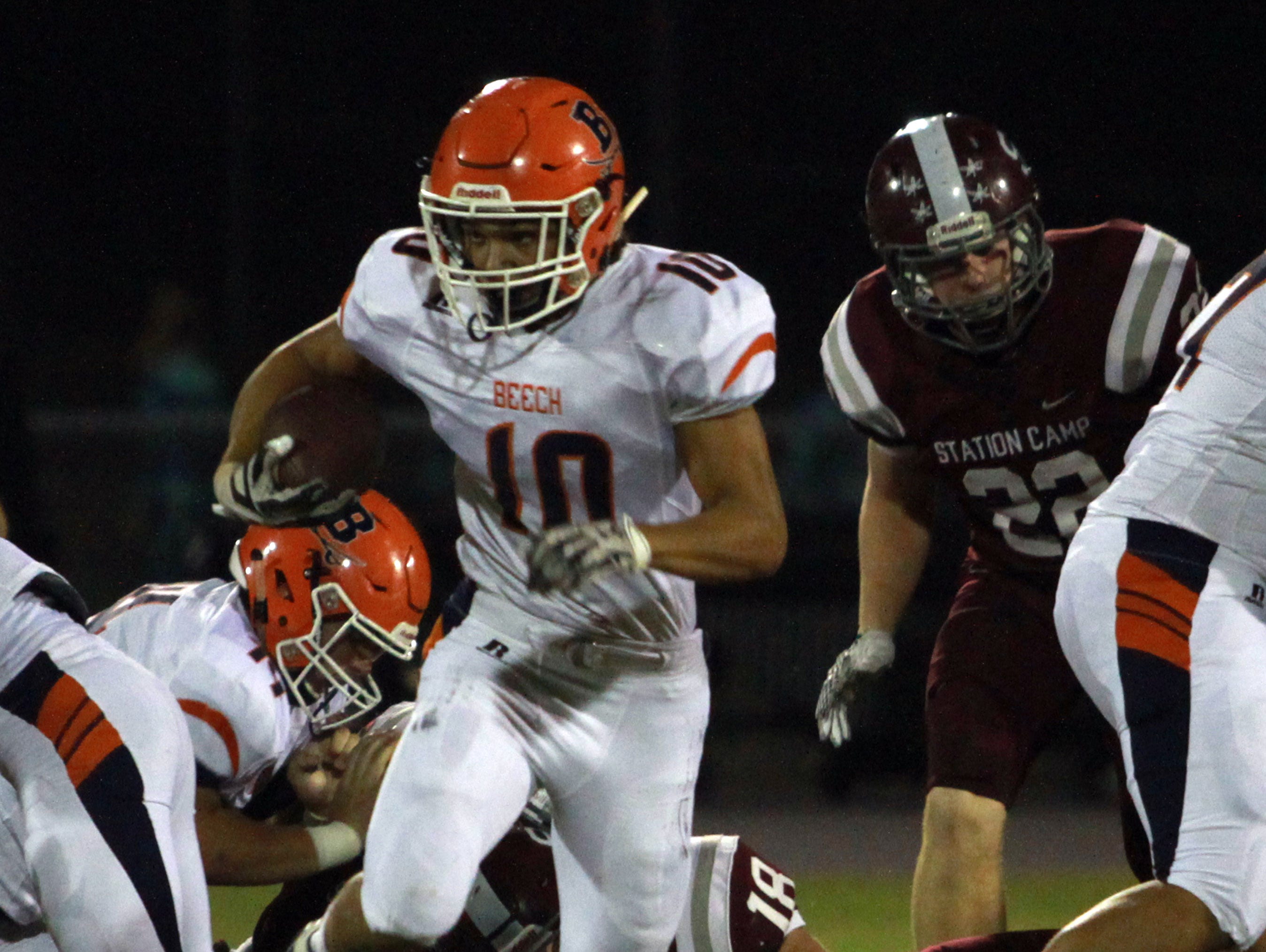 Beech's Chaz Williamson finds a hole to rush through during Friday's game at Station Camp.