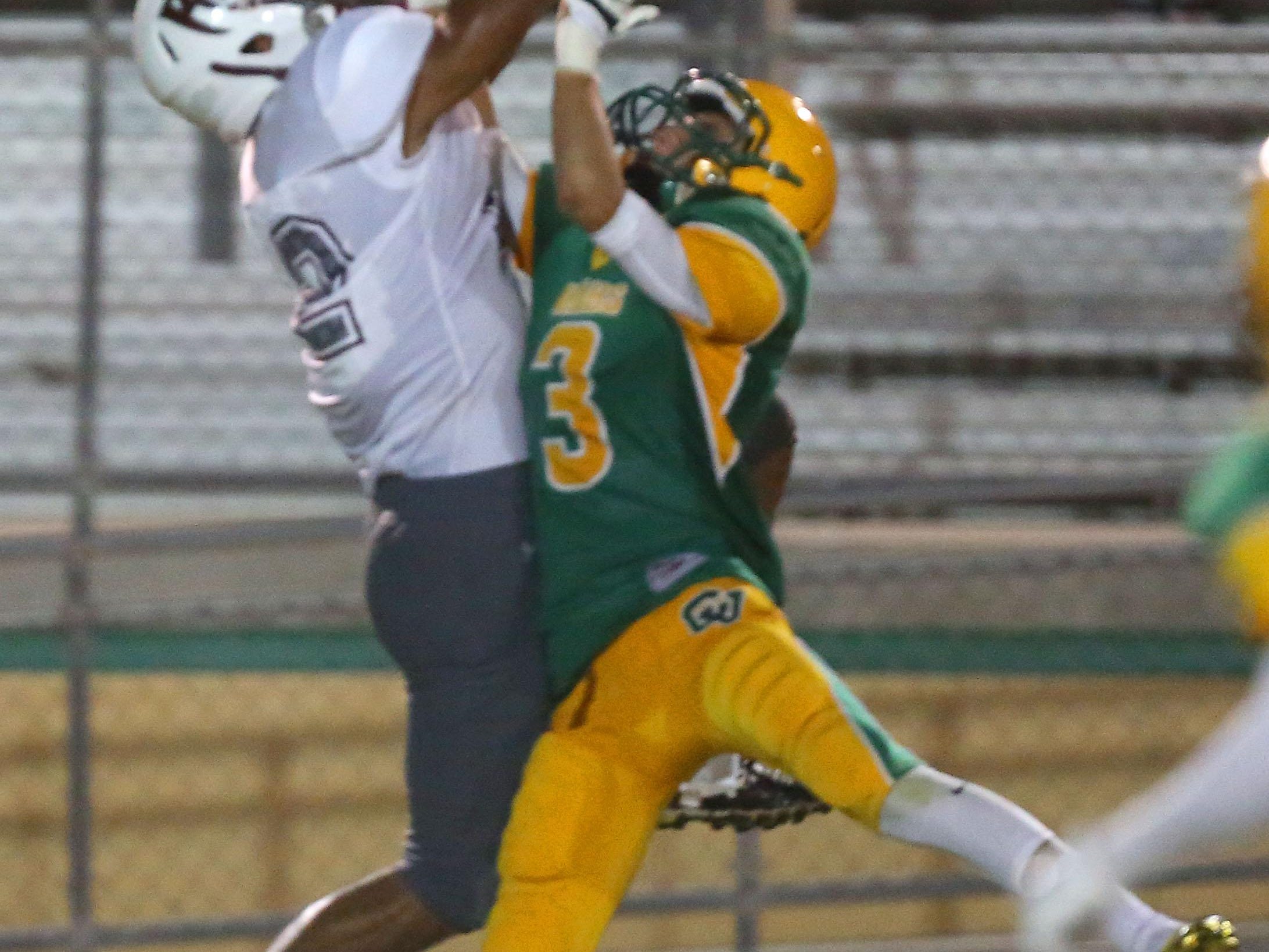 Daryn Evans hauls in a pass for Rancho Mirage as Carl Ortiz of Coachella defends, Friday, August 28, 2015.