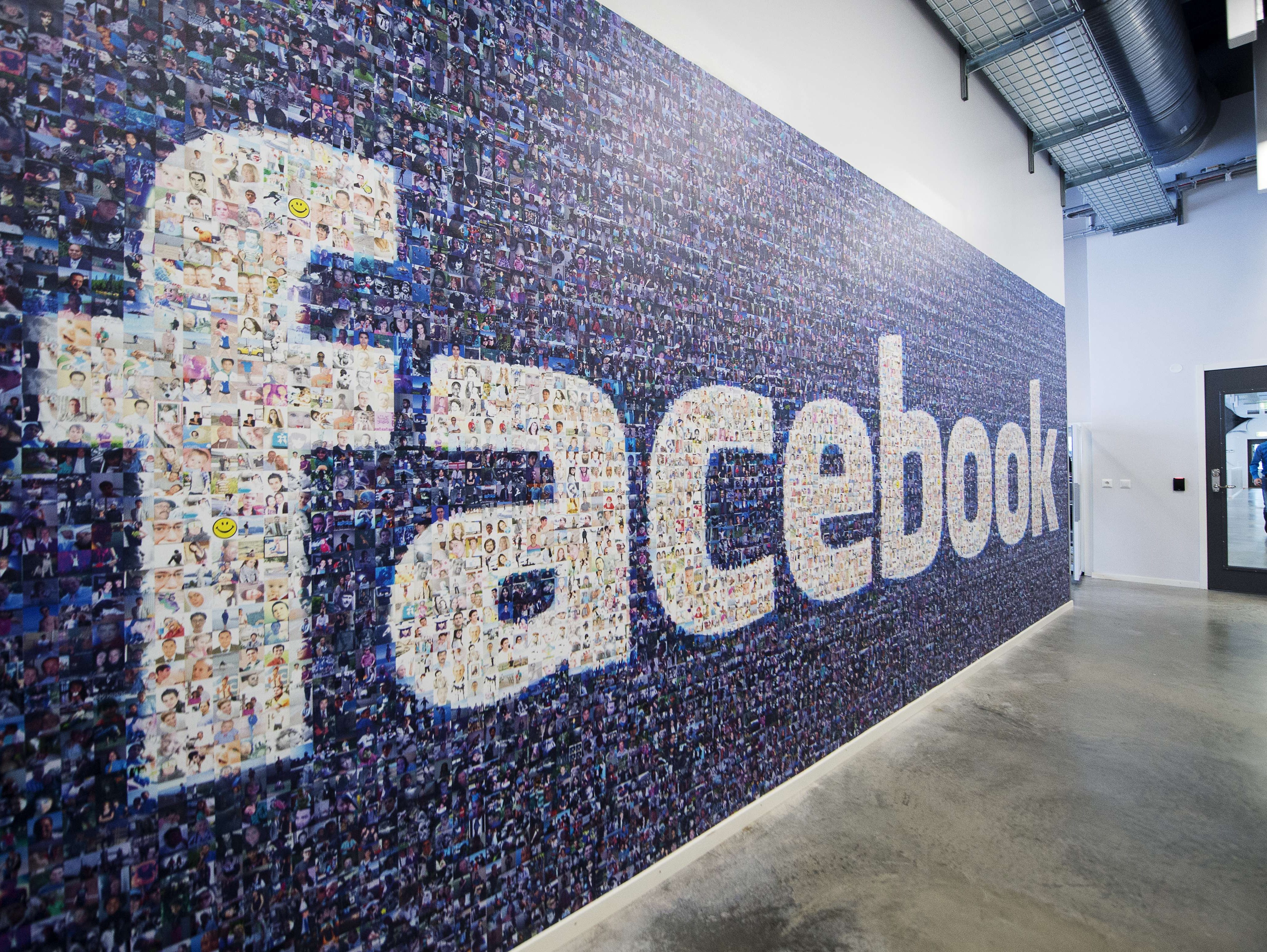 A big logo created from pictures of Facebook users worldwide is pictured in the company's Data Center, its first outside the US on November 7, 2013 in Lulea, in Swedish Lapland. T