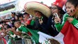 Mexican team fans cheer before the start of the game