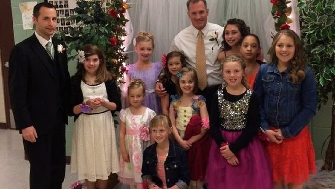 Police surprise girls with daddy-daughter dance - USA TODAY
