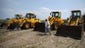 Ronald Hill prepares front end loaders in Oregon Inlet, N.C.