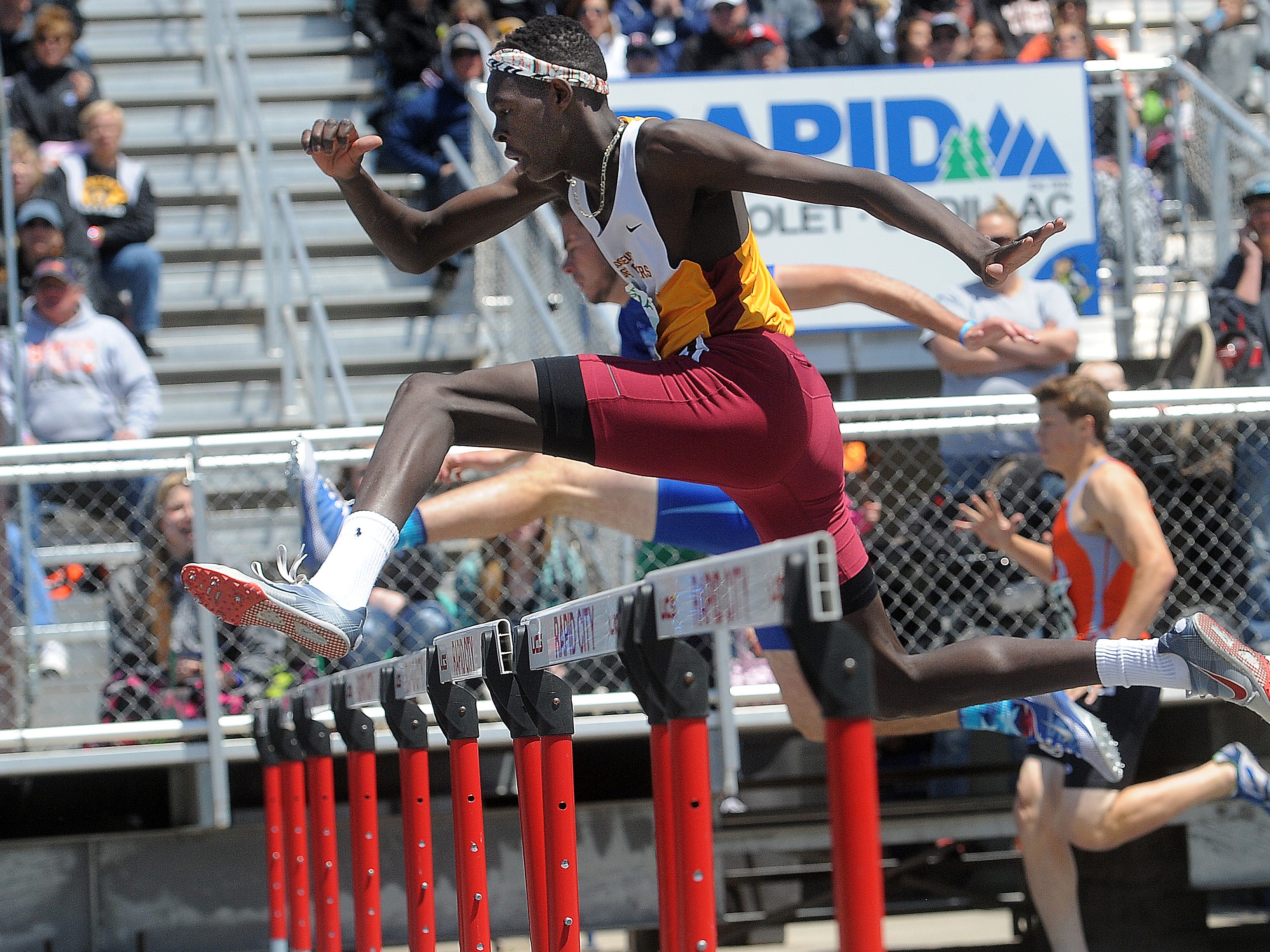 Roosevelt’s Mayuen Akok race to victory Saturday in Rapid City in the 300 hurdles. His time was 39.72 seconds. He later helped the Rough Riders to a win in the 800 relay.