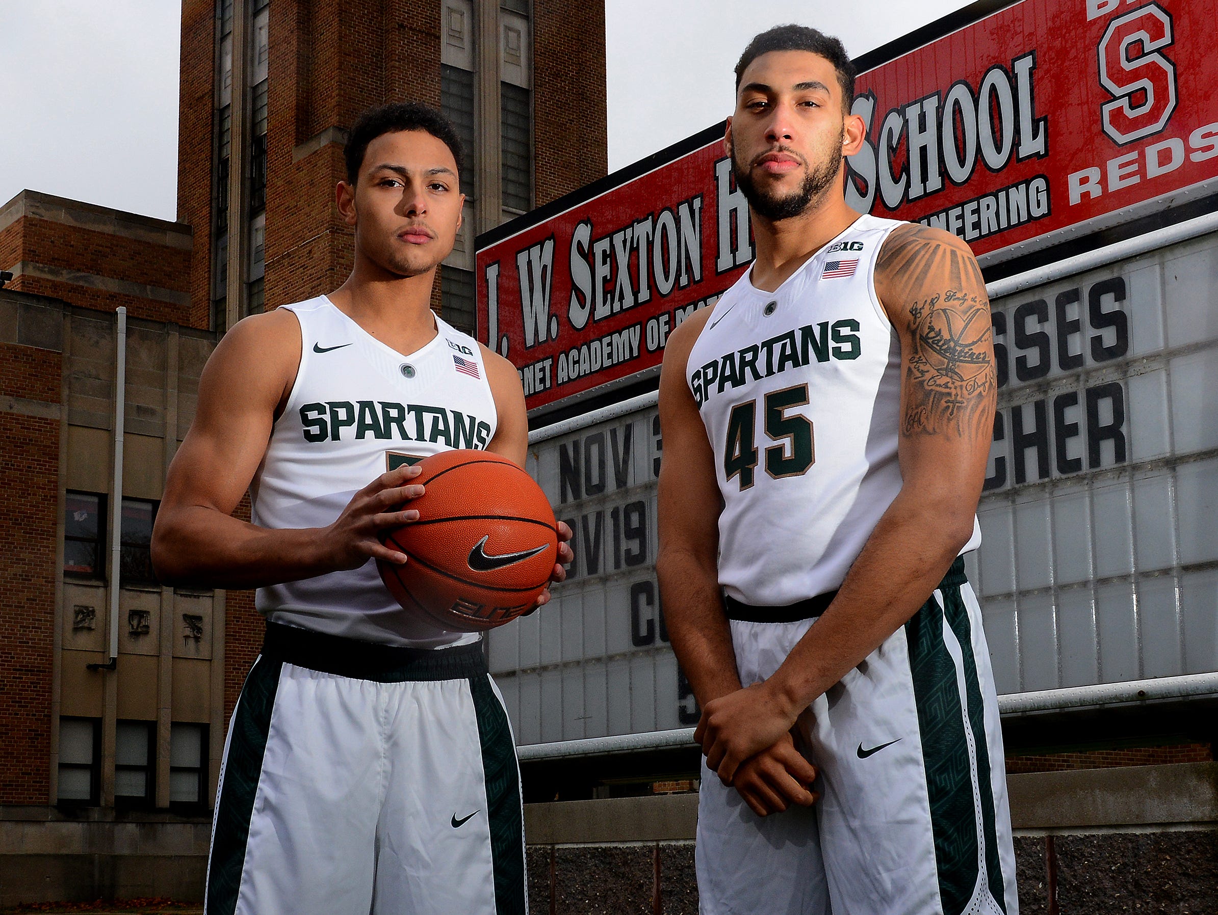 Bryn Forbes, left, and Denzel Valentine, both Lansing Sexton High School graduates, posed for this LSJ cover photo on Oct. 29. They are the Spartans' two leading scorers.