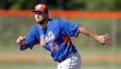 Sept. 28: Tim Tebow runs the base during practice before