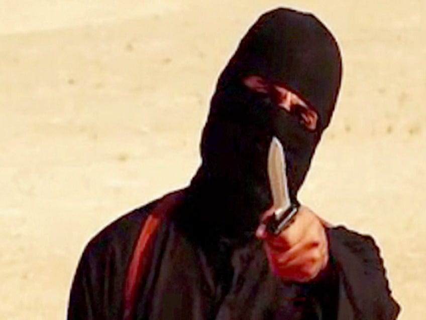 An image grab taken from a video released by the Islamic State and identified by private terrorism monitor SITE Intelligence Group on September 2, 2014 purportedly shows a masked militant holding a knife and gesturing as he speaks to the camera in a 