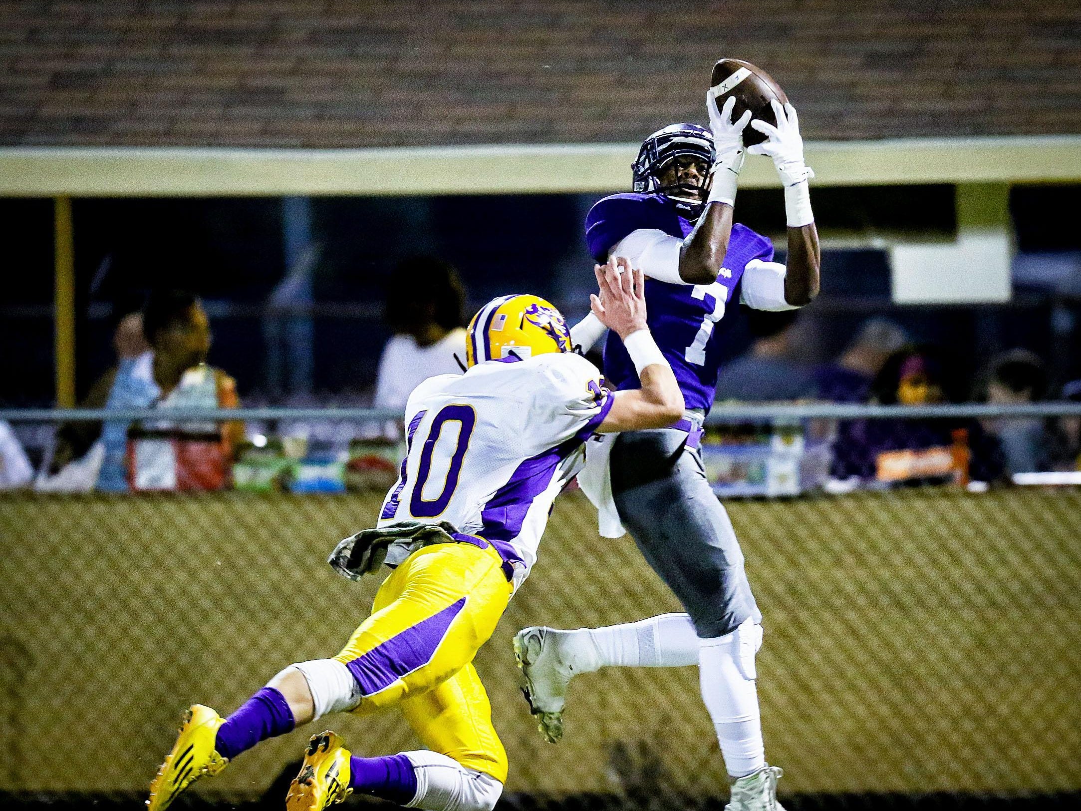 OC wide receiver Jacobi Richard hauls in a pass Thursday against Jeanerette.