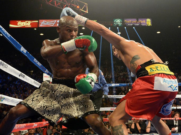 The judges scored the fight 116-111, 116-111, 115-112 in favor of Mayweather.