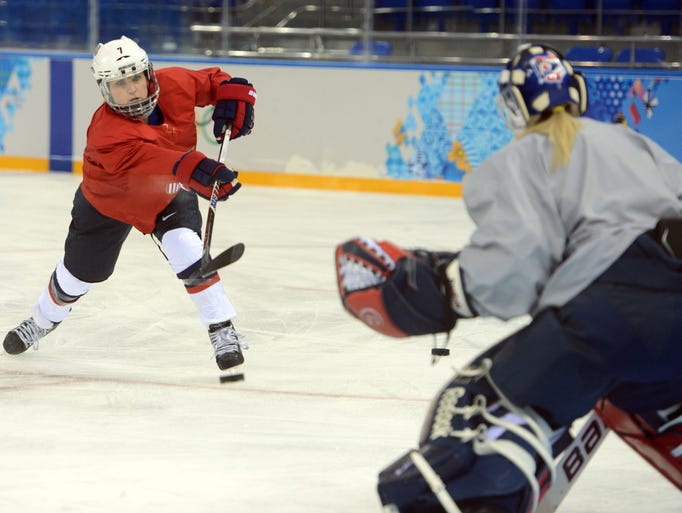USA forward Monique Lamoureux (7) shoots during a practice session in preparation for the 2014 Sochi Olympic Winter Games at Shayba Arena.