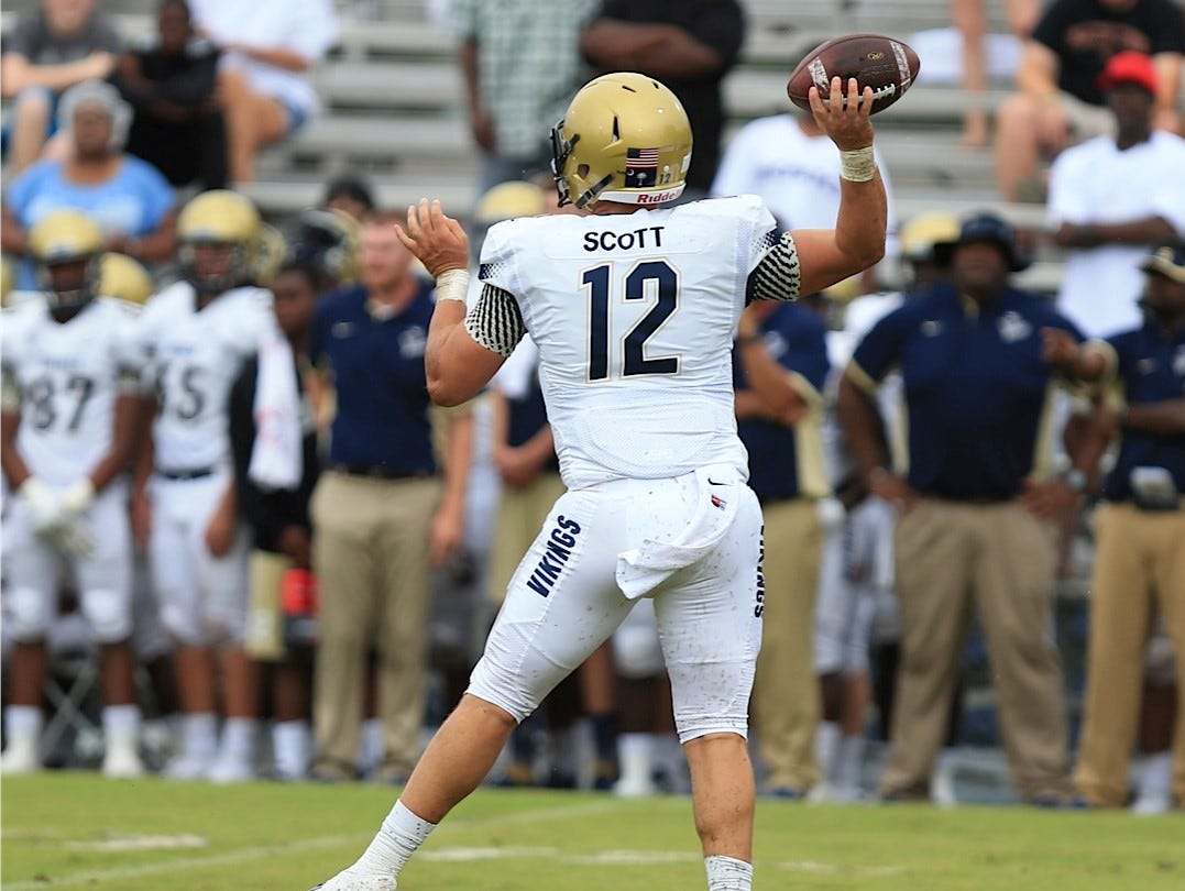 Spartanburg quarterback Austin Scott delivers one of many passes during a game against Wakulla on Saturday.