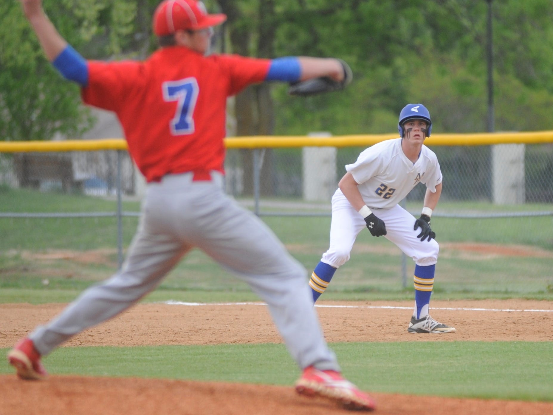 Mountain Home’s Sky-Lar Culver (22) leads away from first base during the fourth inning of the Bombers’ 6-4 victory over Marion on Tuesday night at Cooper Park. Culver slugged a two-out grand slam in the bottom of the seventh to give the Bombers the league win.
