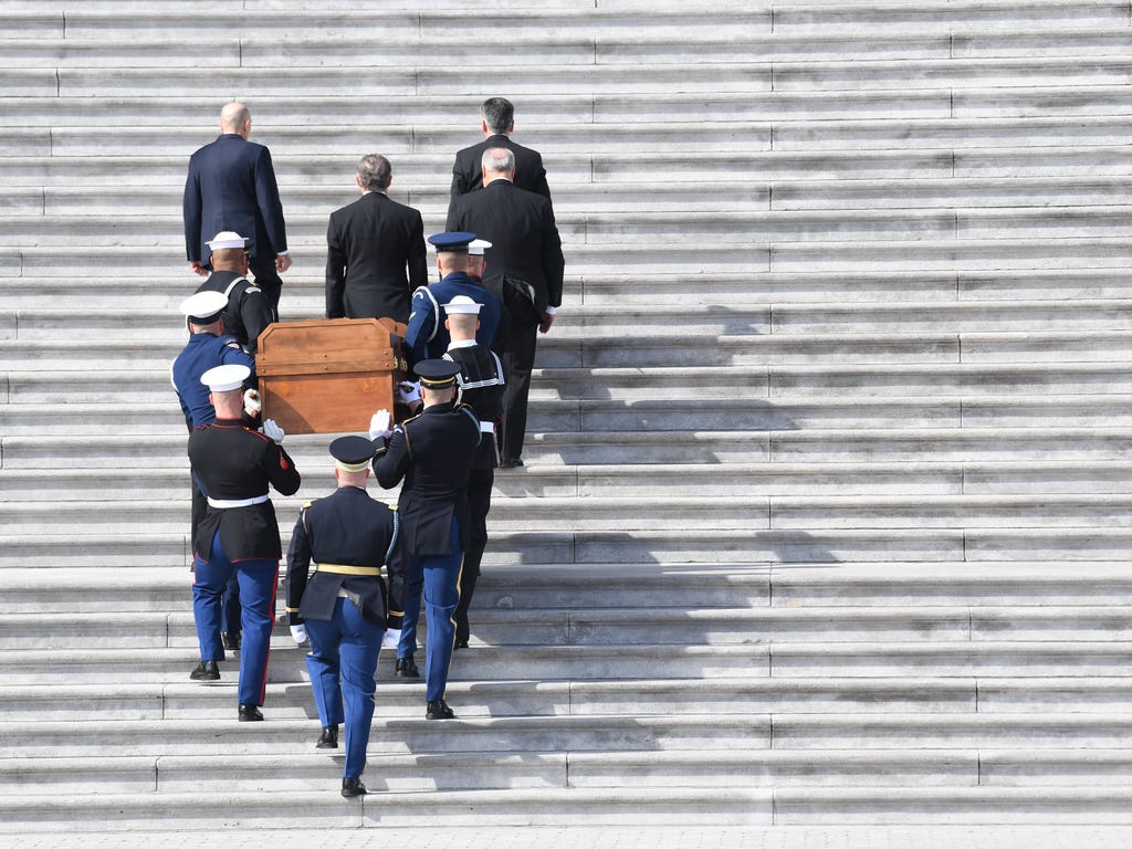 The body of evangelist Billy Graham is carried into the U.S. Capitol as Graham will lie in honor under the U.S. Capitol rotunda as Congress pays tribute to a clergyman who counseled presidents and preached the Gospel to millions worldwide.