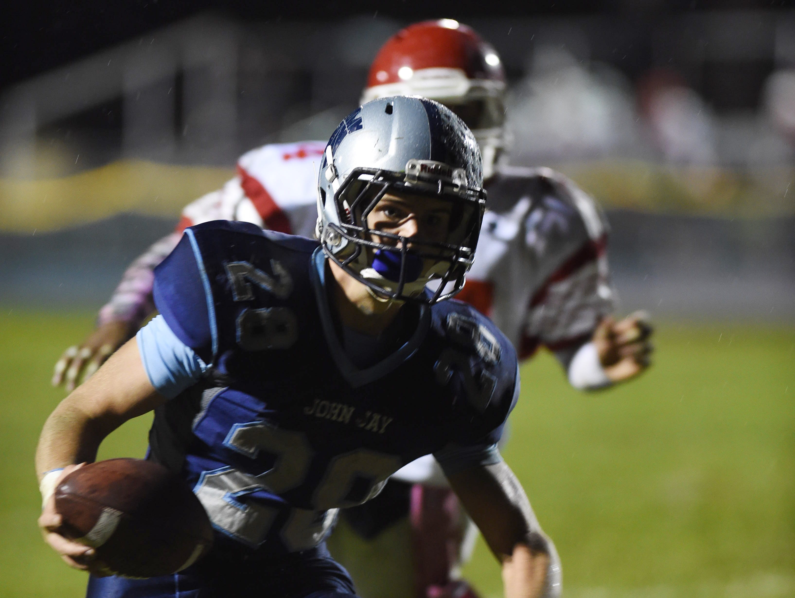 John Jay's Danny Diedrich crosses the goal line for the two point conversion in the third quarter during Friday's home game versus North Rockland.