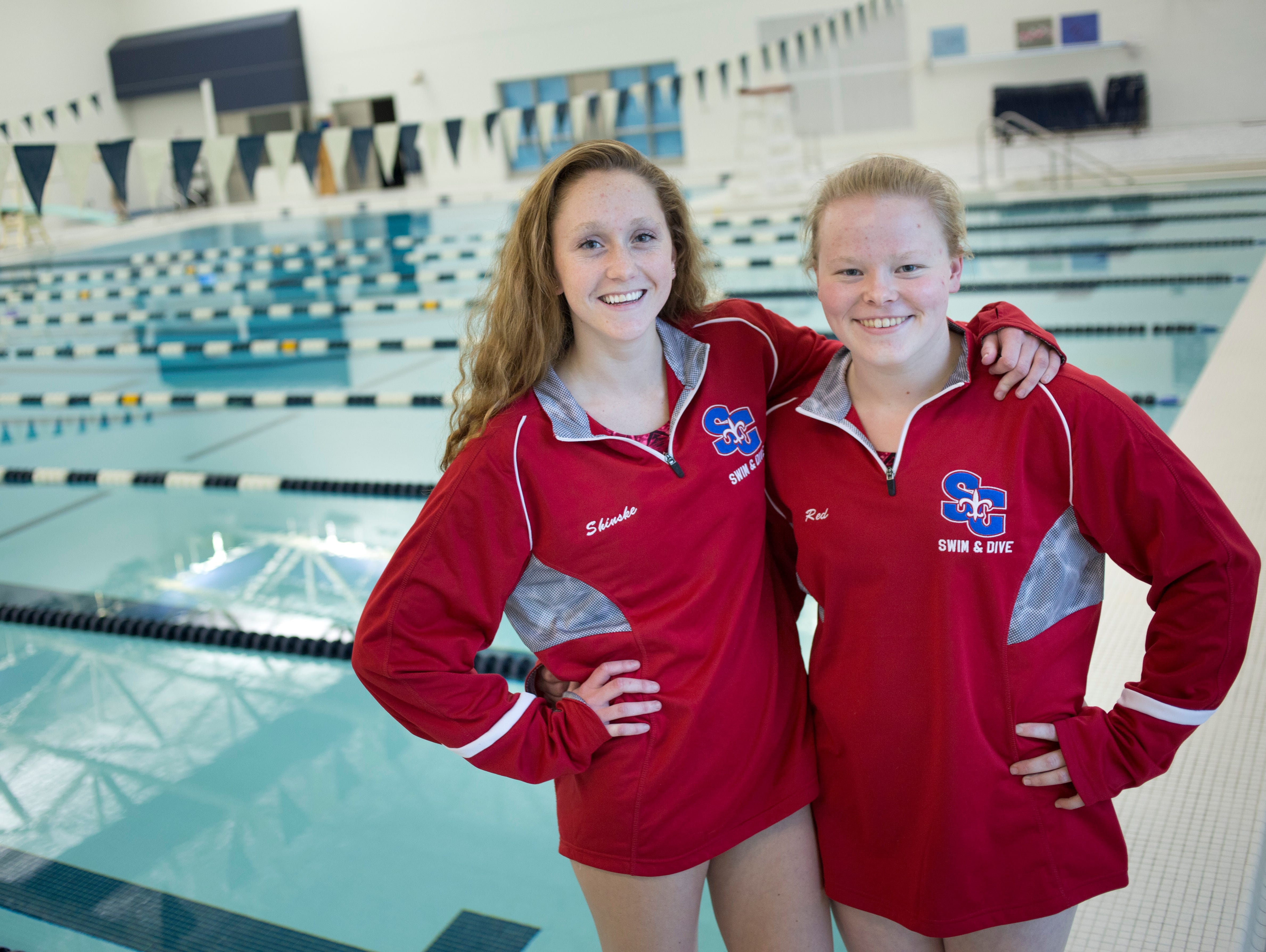 St. Clair senior Grace Shinske and Alexis Smith pose before practice Wednesday, November 18, 2015 in Marysville. The team will be competing in a state meet this weekend.