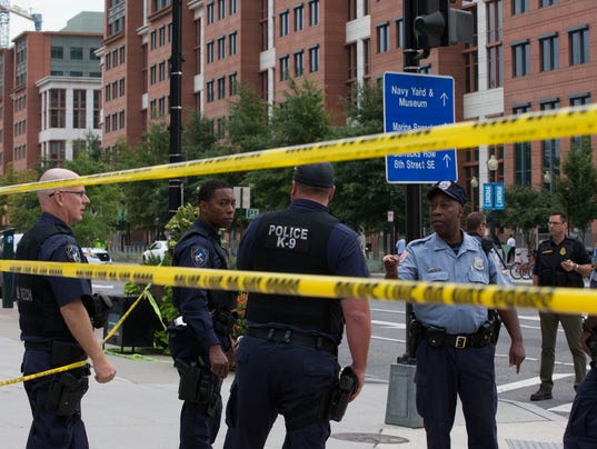 Gunman opens fire at Navy Yard in Washington; several wounded, officials say 1379338395000-AP-US-Shooting-Military-Building