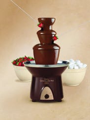 The Wilton Chocolate Pro holds up to four pounds of