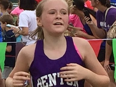 A Benton runner heads to the finish line in the middle school girls' division of Saturday's Ark-La-Tex Border Dash.