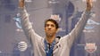 Michael Phelps waves to the crowd after winning the