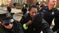 Baltimore Police sergeant covers her face with her