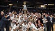 Iona celebrates beating Siena in overtime, 87-86, to