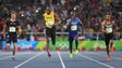 Usain Bolt (JAM) races ahead of the pack in the men's
