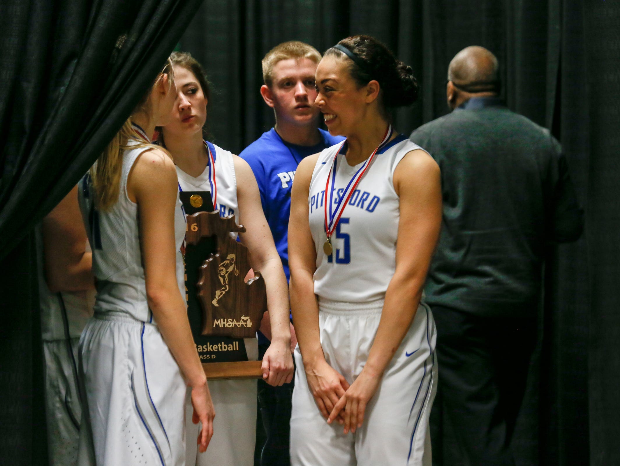 Madison Ayers of the Pittsford Wildcats talks during the press conference after winning the MHSAA girls basketball Class D finals at the Breslin Center in East Lansing on Saturday, March 19, 2016.