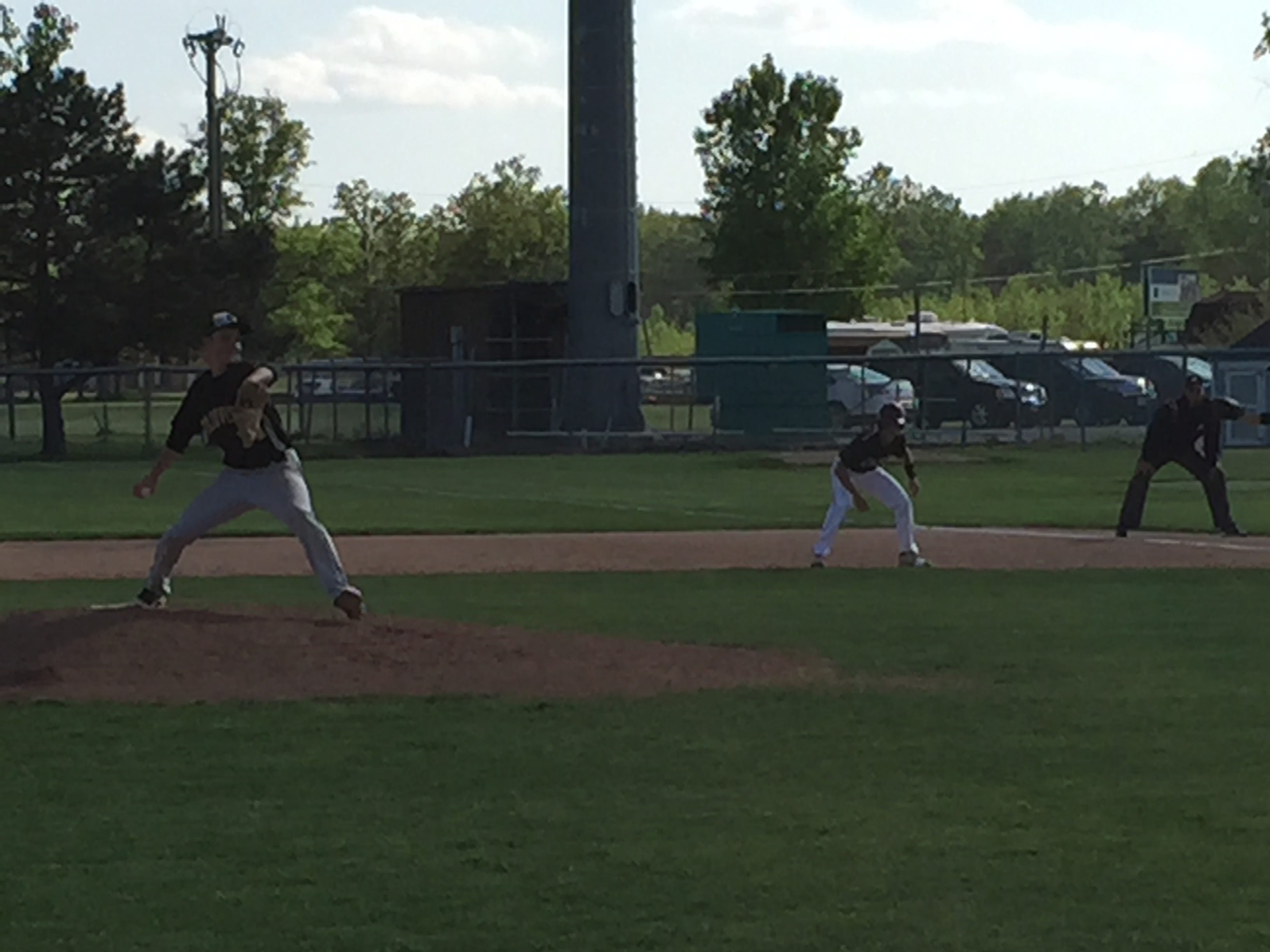 Genoa pinch-runner Noah Edwards leads off first base Thursday against Sherwood Fairview. Edwards scored in the inning.