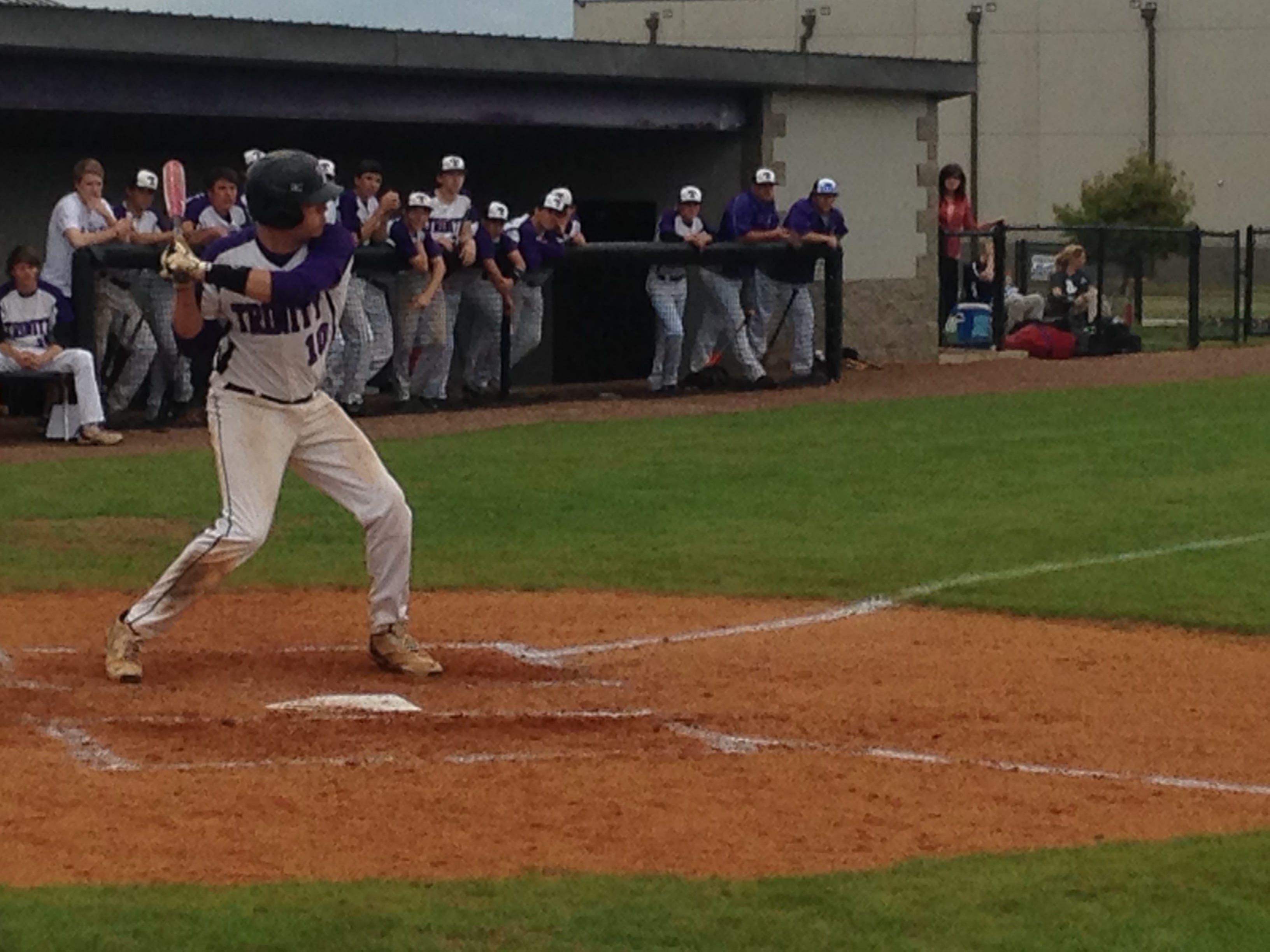Trinity’s Avery Schwarz prepares to swing in the second inning of Monday’s 4-3 loss to Riverside. Schwarz singled and had an RBI groundout.