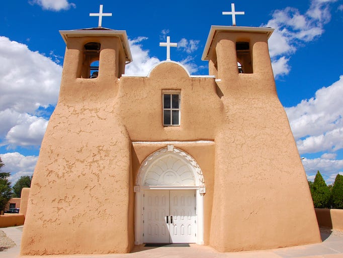 Taos, N.M., is famous for its                                                           traditional