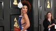 Joy Villa gives the back view of her Trump gown.