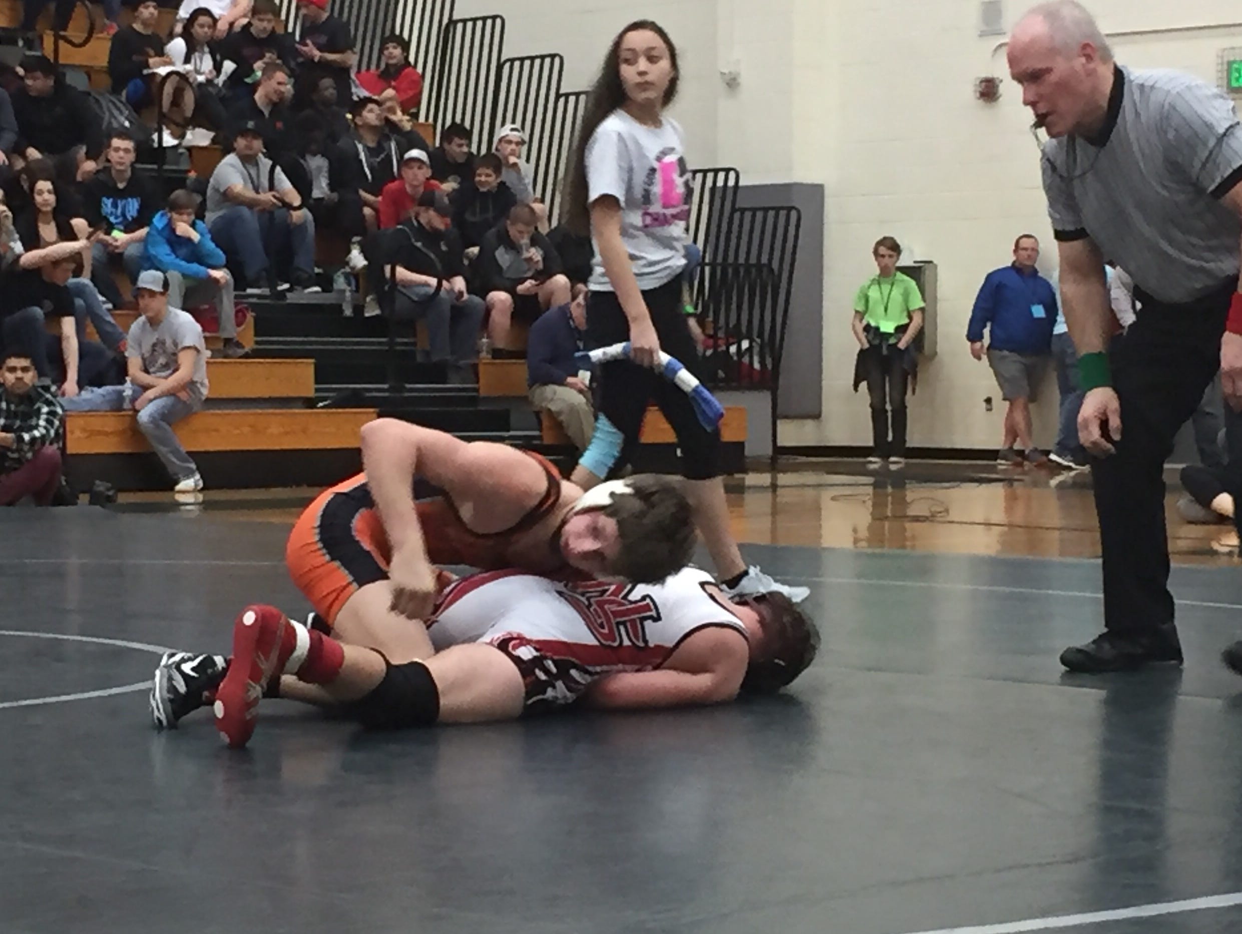 Sprague's Daniel McClung, top), posted a 16-4 decision over North Salem's Shannon Glover in the GVC district championship match at 126 pounds.