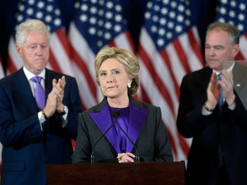 Hillary Clinton with Bill Clinton and Tim Kaine in New York City on Nov. 9, 2016.