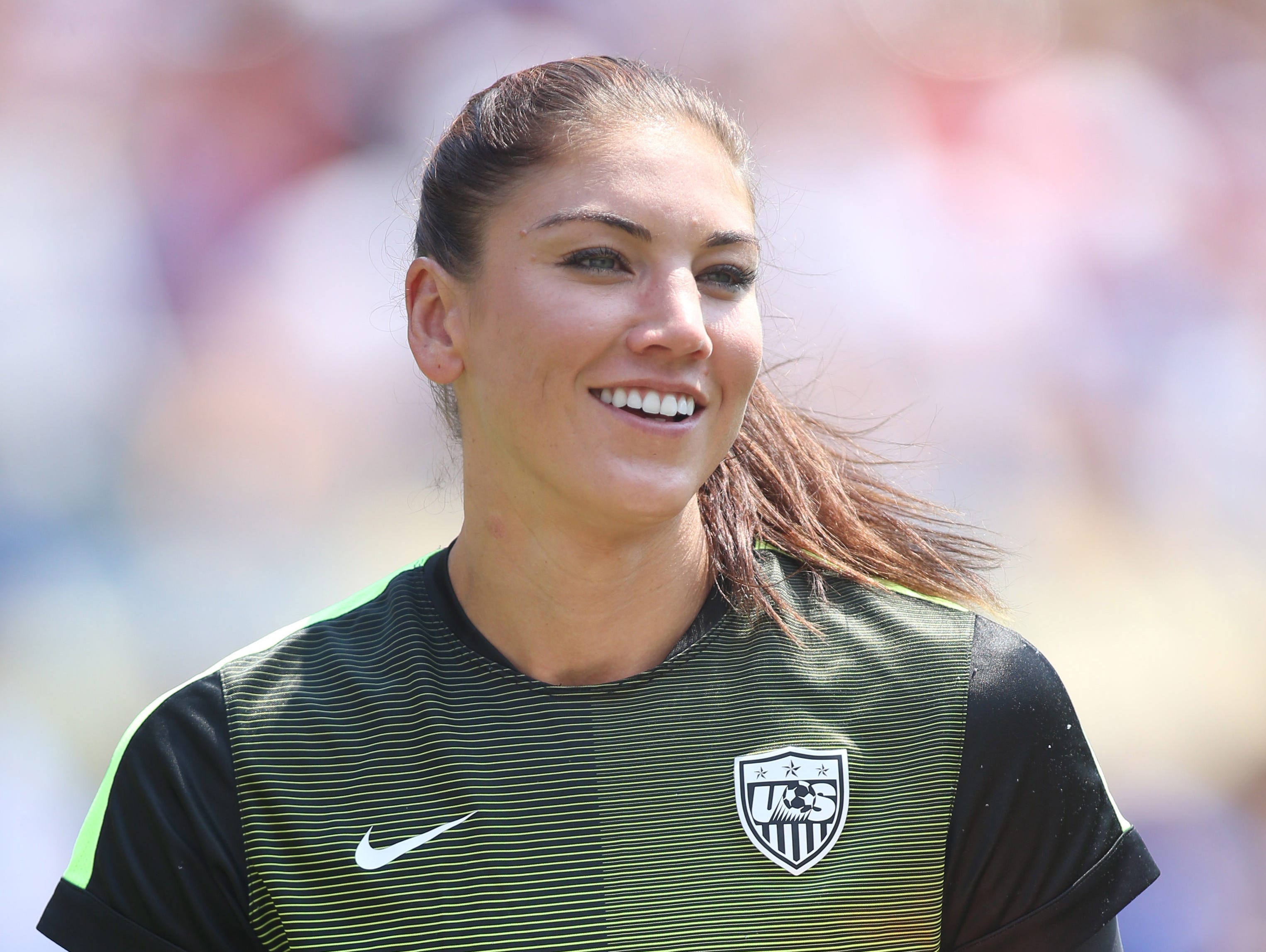 Hope Solo will face domestic violence charges after an appeals court on Friday reversed a decision to throw out the case.