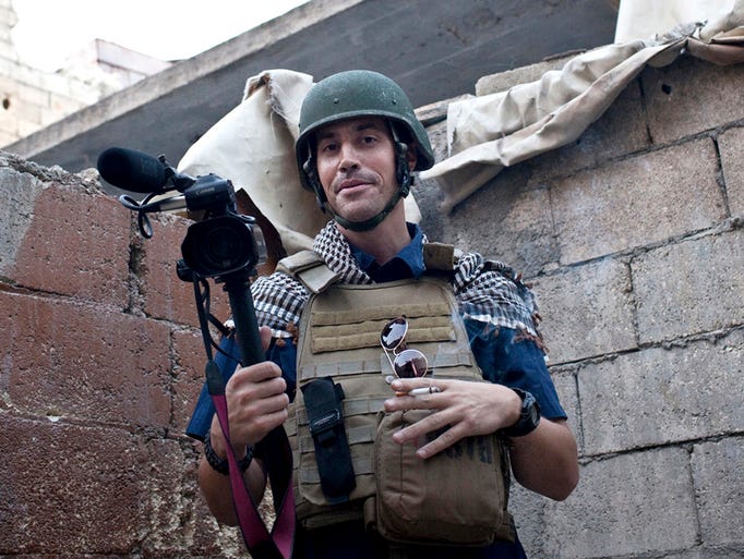 In this November 2012 photo posted on the website freejamesfoley.org, journalist James Foley covers the civil war in Aleppo, Syria.