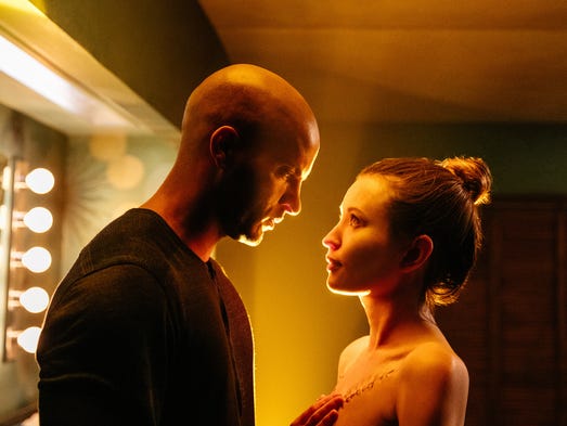 Shadow Moon (Ricky Whittle) and his wife Laura (Emily