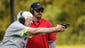 Mary Southerland, 83, of Hidden Valley Lake in Indiana,  is closely monitored by Brandon Vornauf, a firearms trainer with Whitewater Valley Firearms Training at Laughery Valley Fish and Game Shooting Range in Versailles.