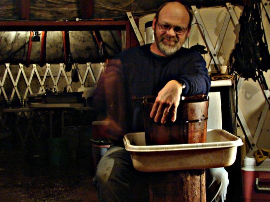 Arden Bailey, founder and owner of Yellowstone Expeditions, makes ice cream in the kitchen yurt. 