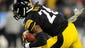 Steelers running back Le'Veon Bell (26) powers over