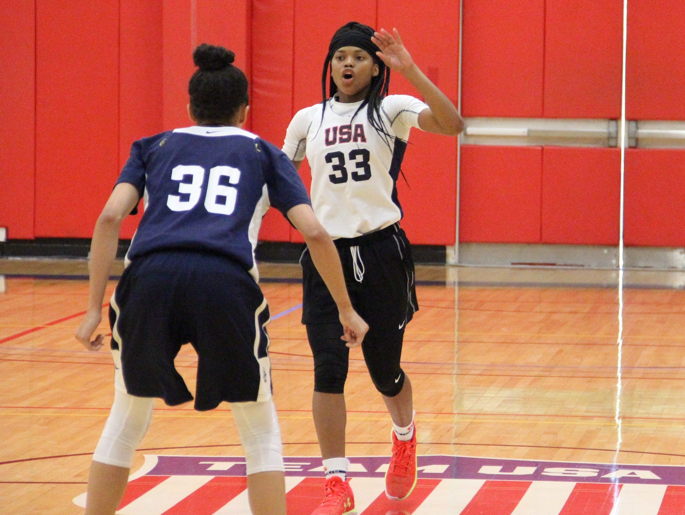 Fort Myers sophomore Destanni Henderson runs the USA women's basketball U17 offense during a practice in Colorado Springs, Colorado.