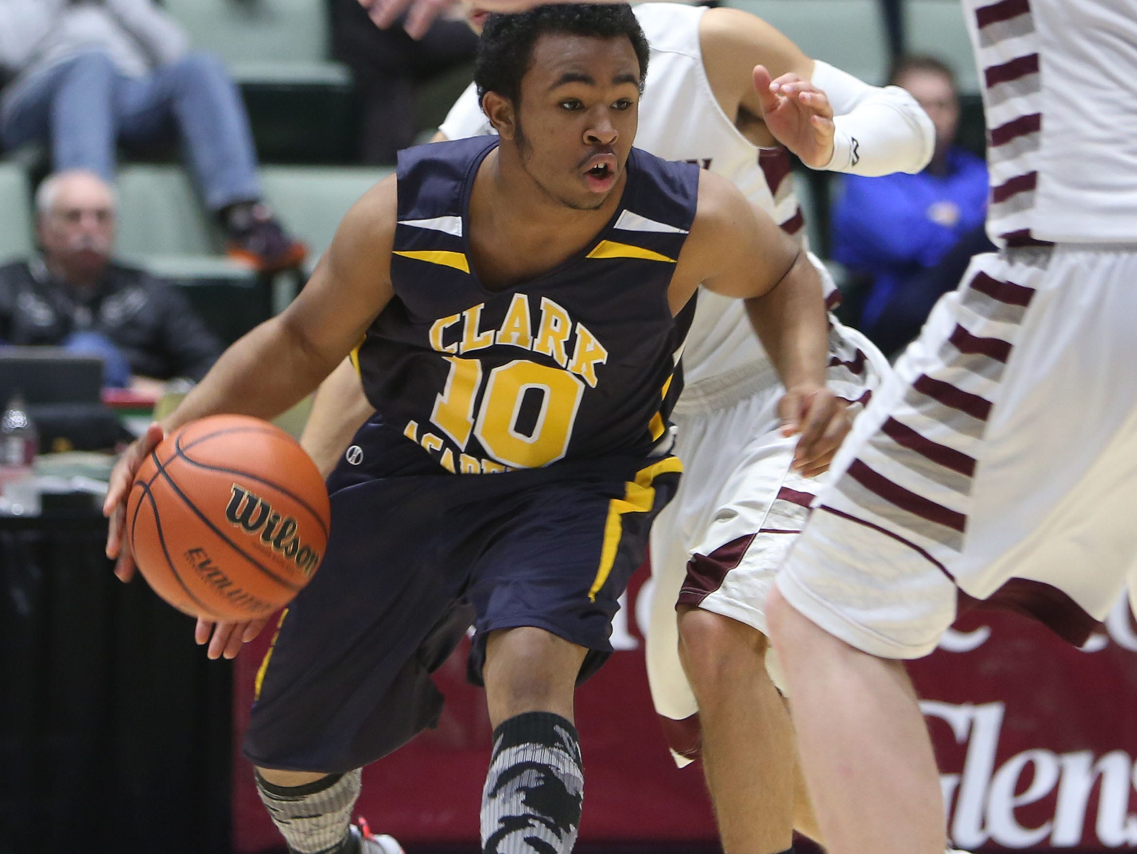 Clark Academy's Brice Banks (10) tries to drive to the basket against Oriskany during the boys Class D semifinal at the Glens Falls Civic Center March 11, 2016. Oriskany won the game 59-40.