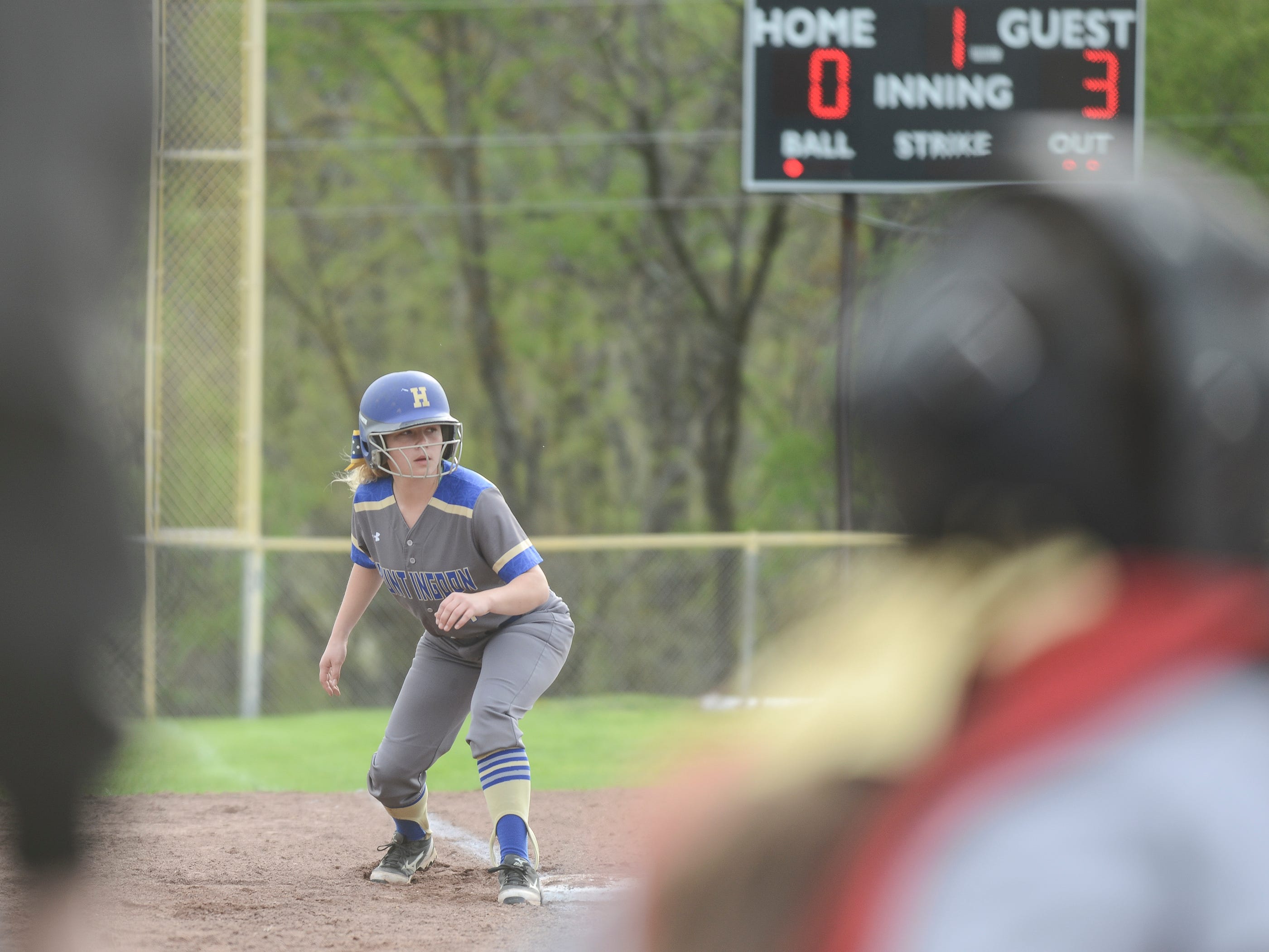 Huntingdon's Lydia Hayes stands ready to head home from third base against McKenzie.