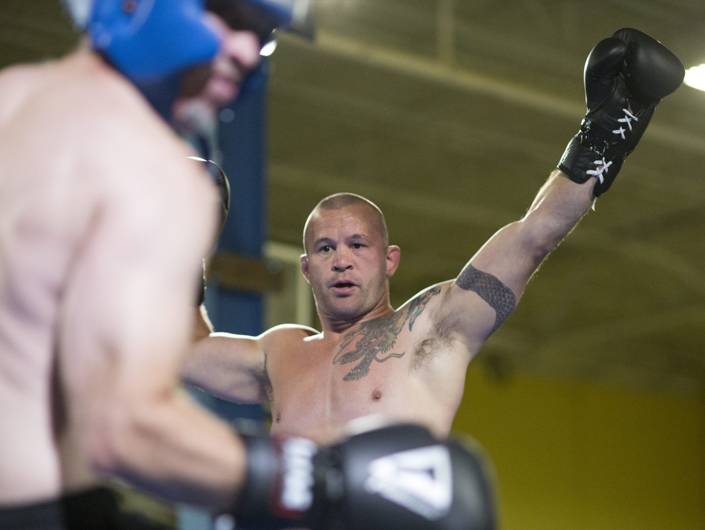 Former UFC fighter Chris Lytle taunted IndyStar columnist Gregg Doyel on Aug. 7, 2015, as they mixed it up during a charity event for Rock Steady Boxing, Indianapolis.