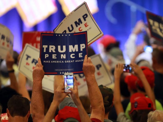 Supporters cheer as Donald Trump unveils his  10-point