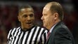 NCAA referee Ted Valentine talks with Wisconsin Badgers