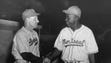 Brooklyn Dodgers manager Leo Durocher, left, shakes