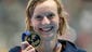 United States' Katie Ledecky holds her gold medal after