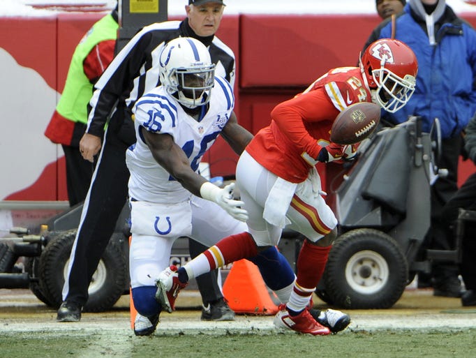 Kansas City Chiefs cornerback Brandon Flowers breaks up a pass intended for Indianapolis Colts wide receiver Da'Rick Rogers.