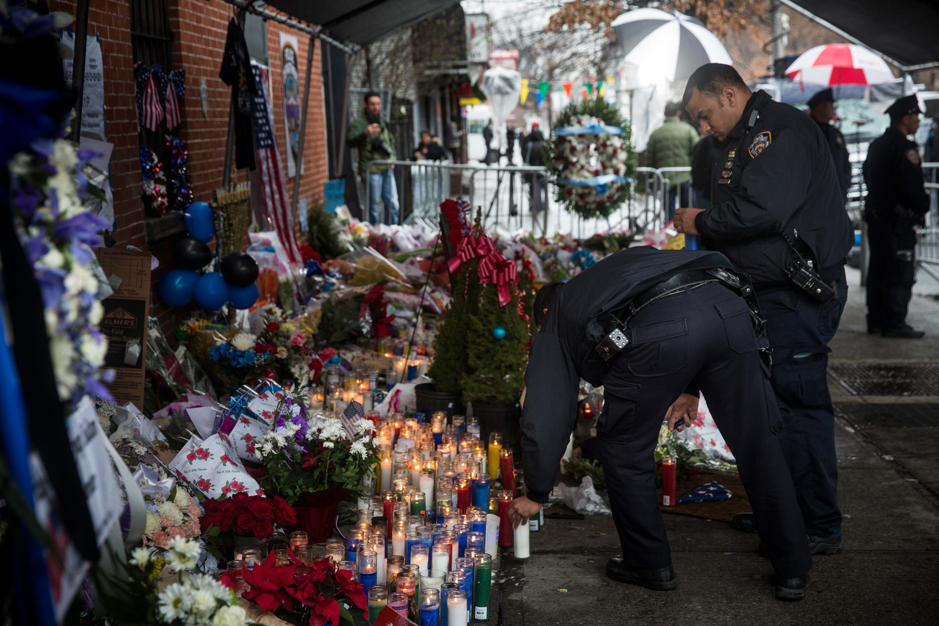 In a sea of blue, NYC cops honor slain officer