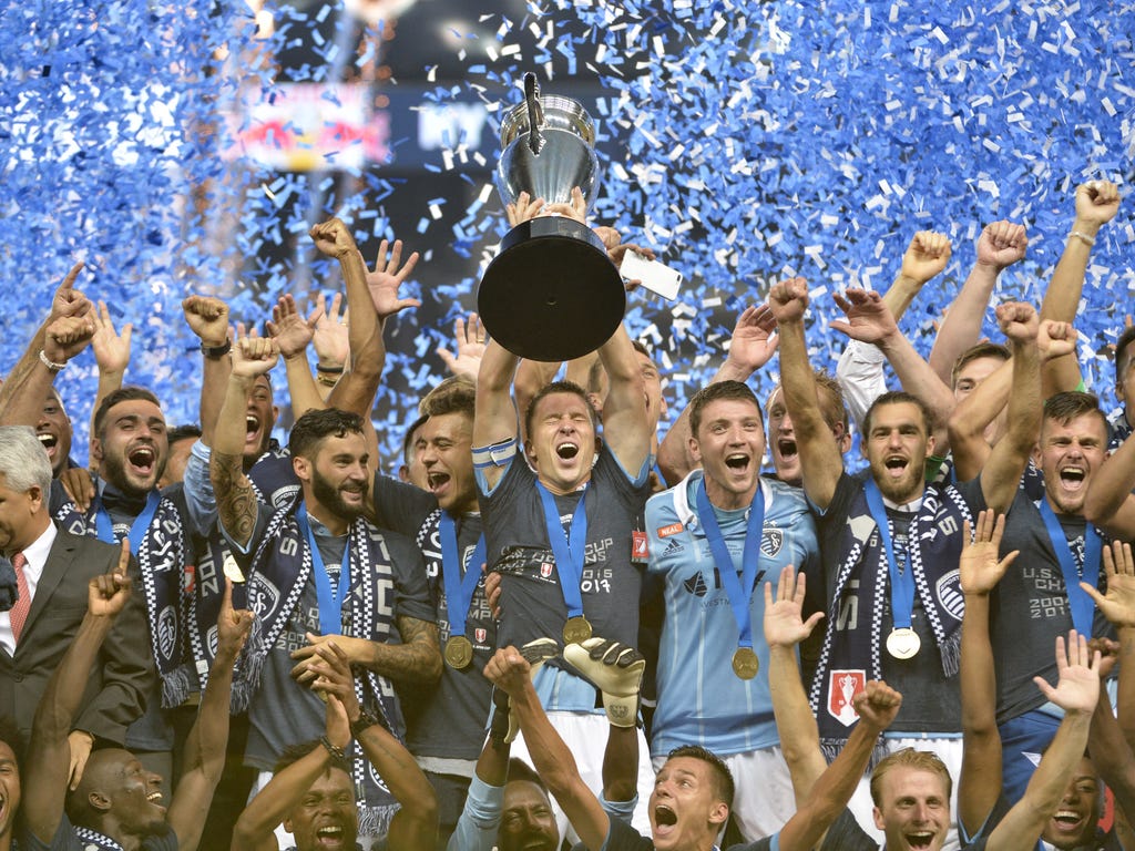Sporting Kansas City celebrates its Lamar Hunt U.S. Open Cup win over the New York Red Bulls at Children's Mercy Park. It was Sporting Kansas City's fourth U.S. Open Cup win.