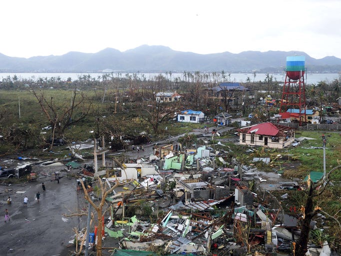 Houses destroyed by Typhoon Haiyan in  Tacloban, on the eastern island of Leyte in the Philippines.